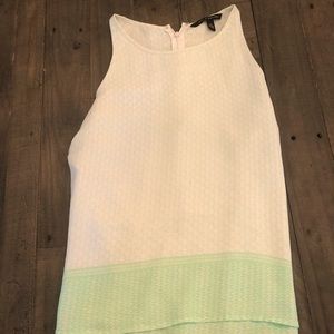Sea foam green and white sleeveless blouse with zipper back. Size small